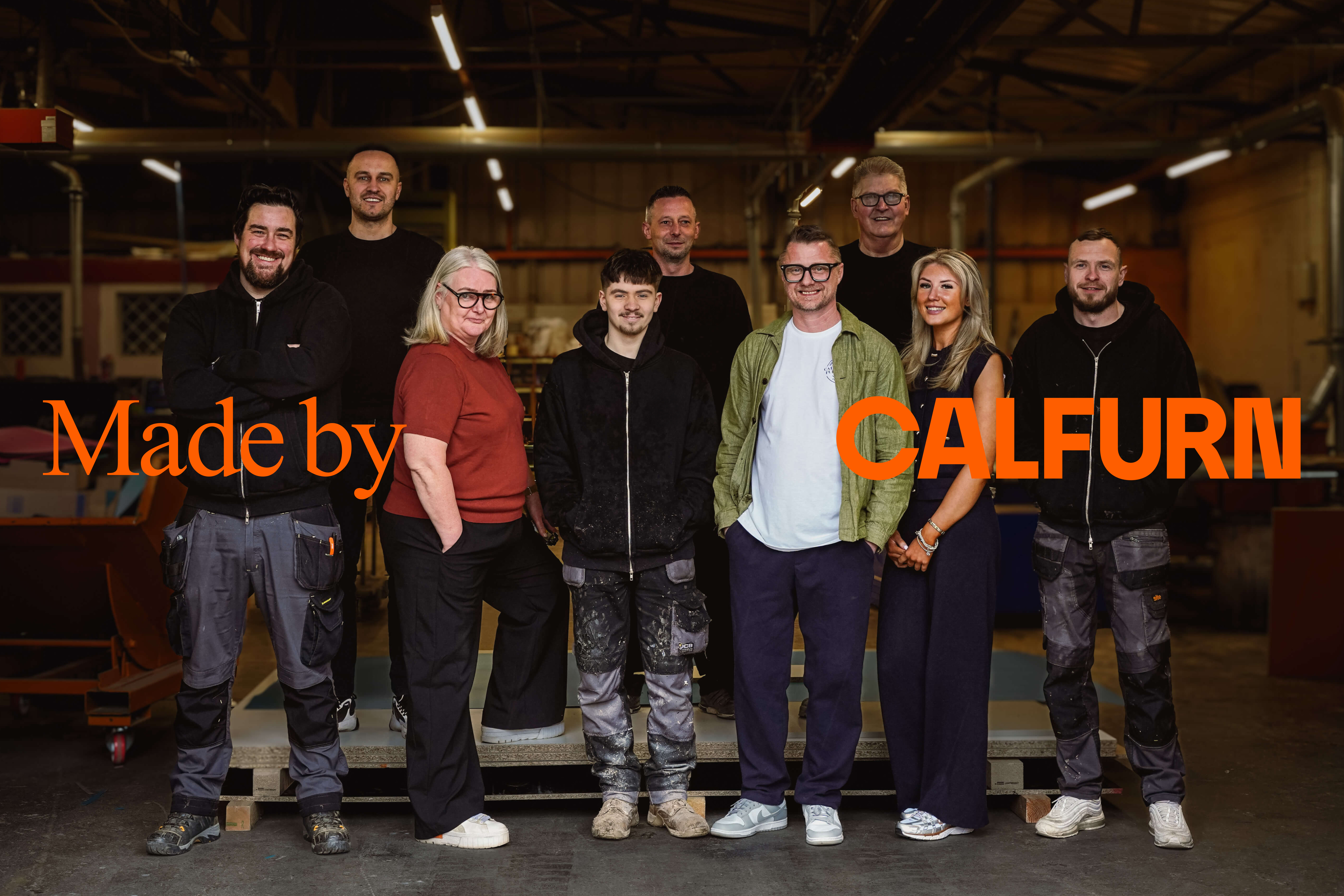 An image of the Calfurn team in the workshop, with the text 'Made by Calfurn' overlaid