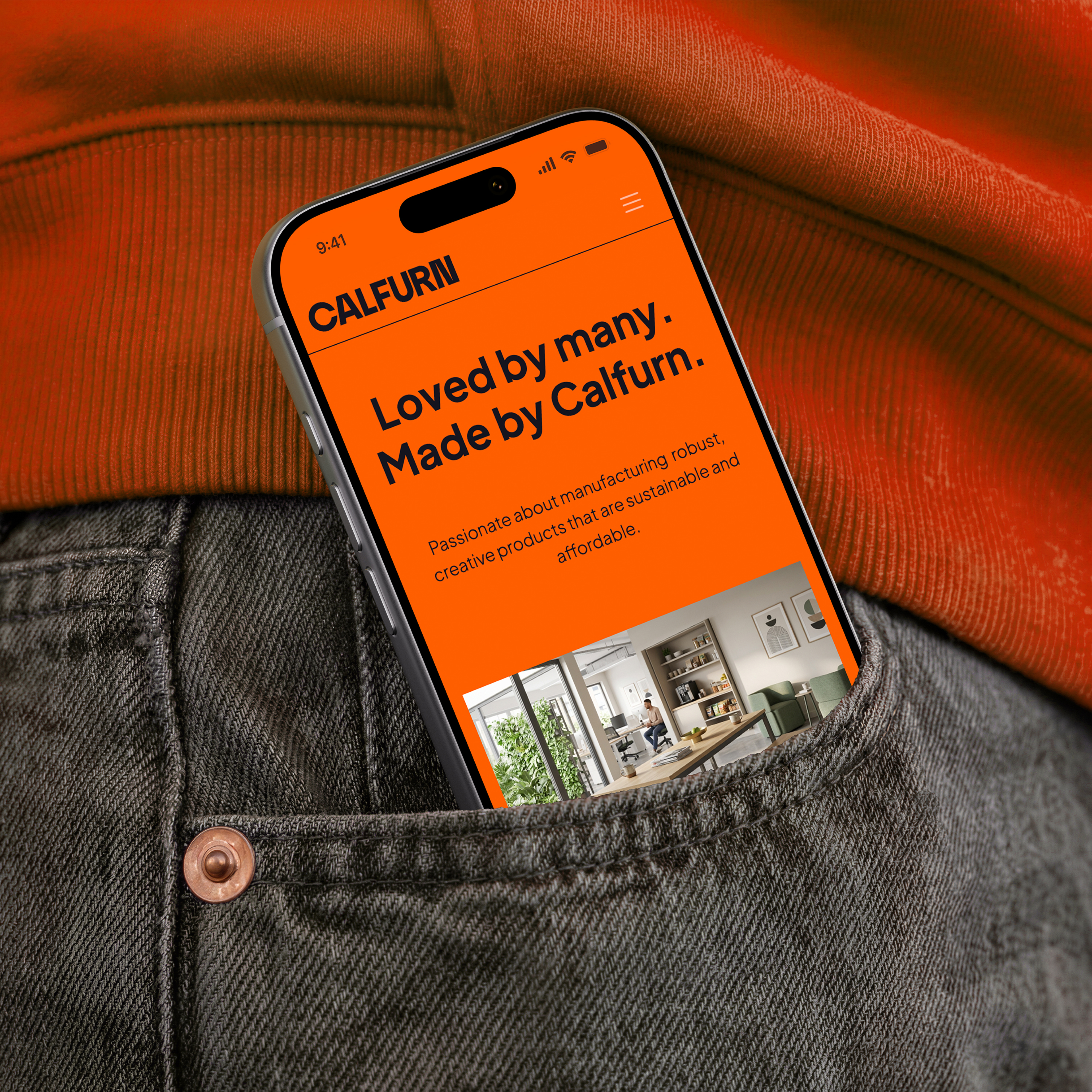 A mobile phone poking out of someone's pocket, displaying the header section of the Calfurn website on its screen.