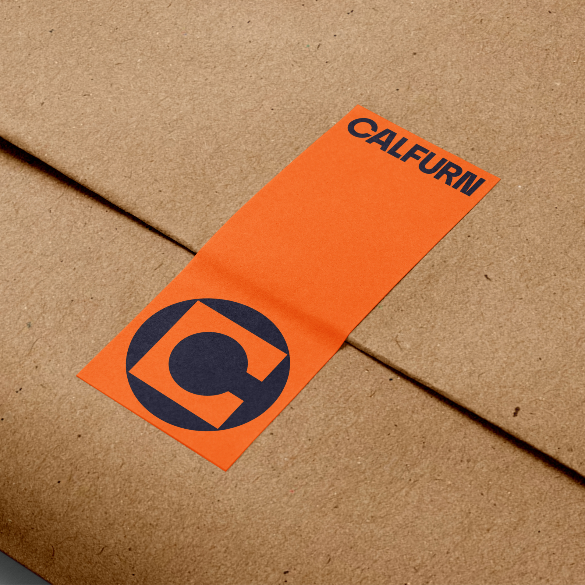 Orange Calfurn branded tape applied to brown paper packaging