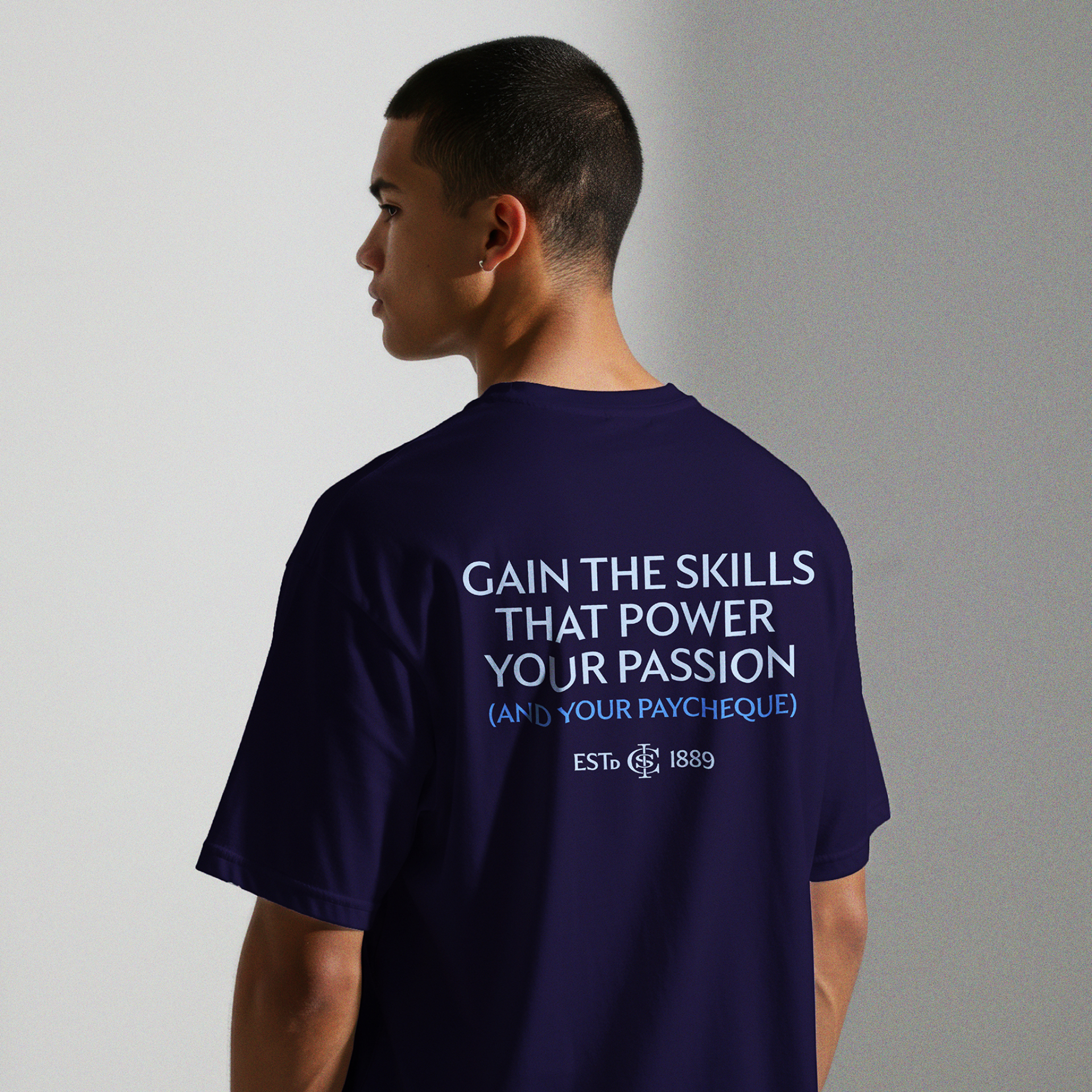 An ICS Learn branded t-shirt being worn by a model